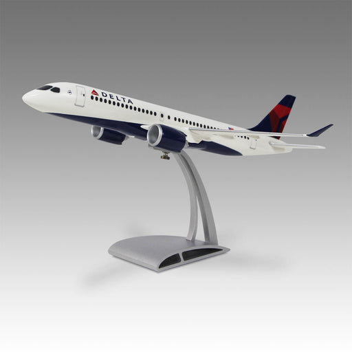 Delta Air Lines A220-300 model airplane on a gray background