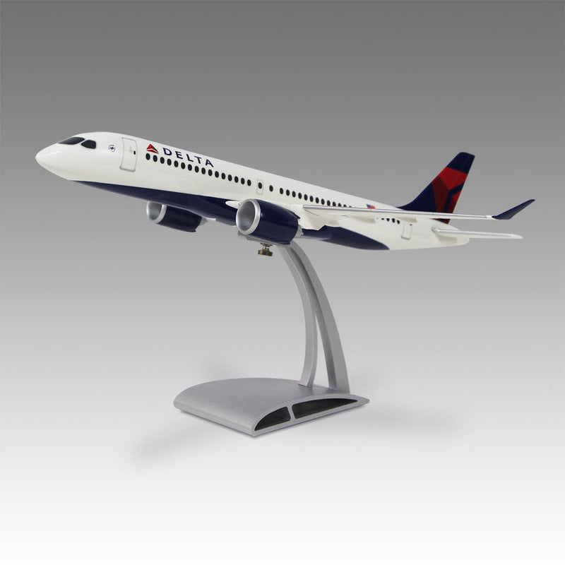 Delta Air Lines A220-300 model airplane on a gray background