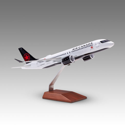 Air Canada A220-300 scale aircraft model on wood base by Pacmin Studios showcasing the right side